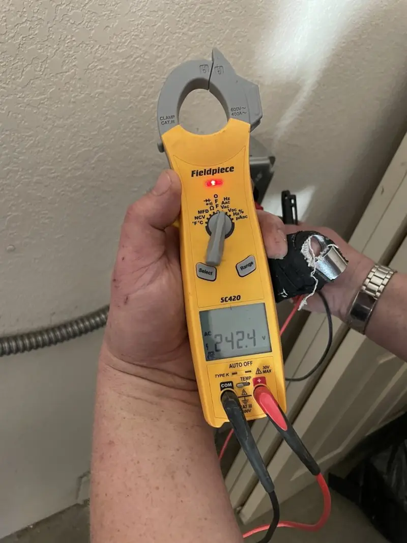 Voltage testing with clamp meter during Electrical Installation Services in Carmichael